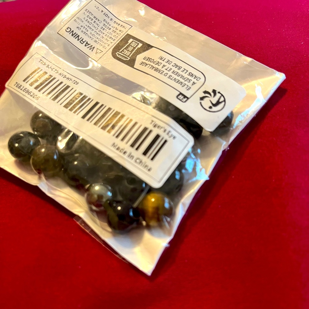 Bag of approx 18-20 Tiger’s Eye Loose Beads